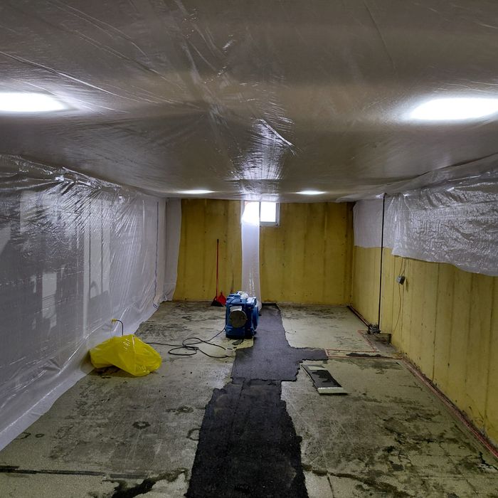 Poly containment and negative air set up in a basement